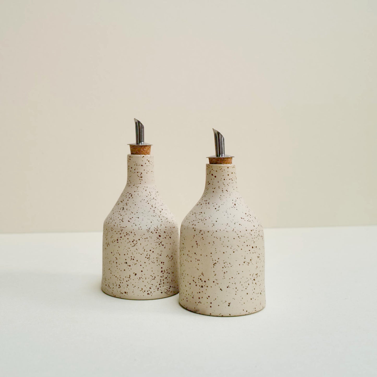 Speckled oil bottle