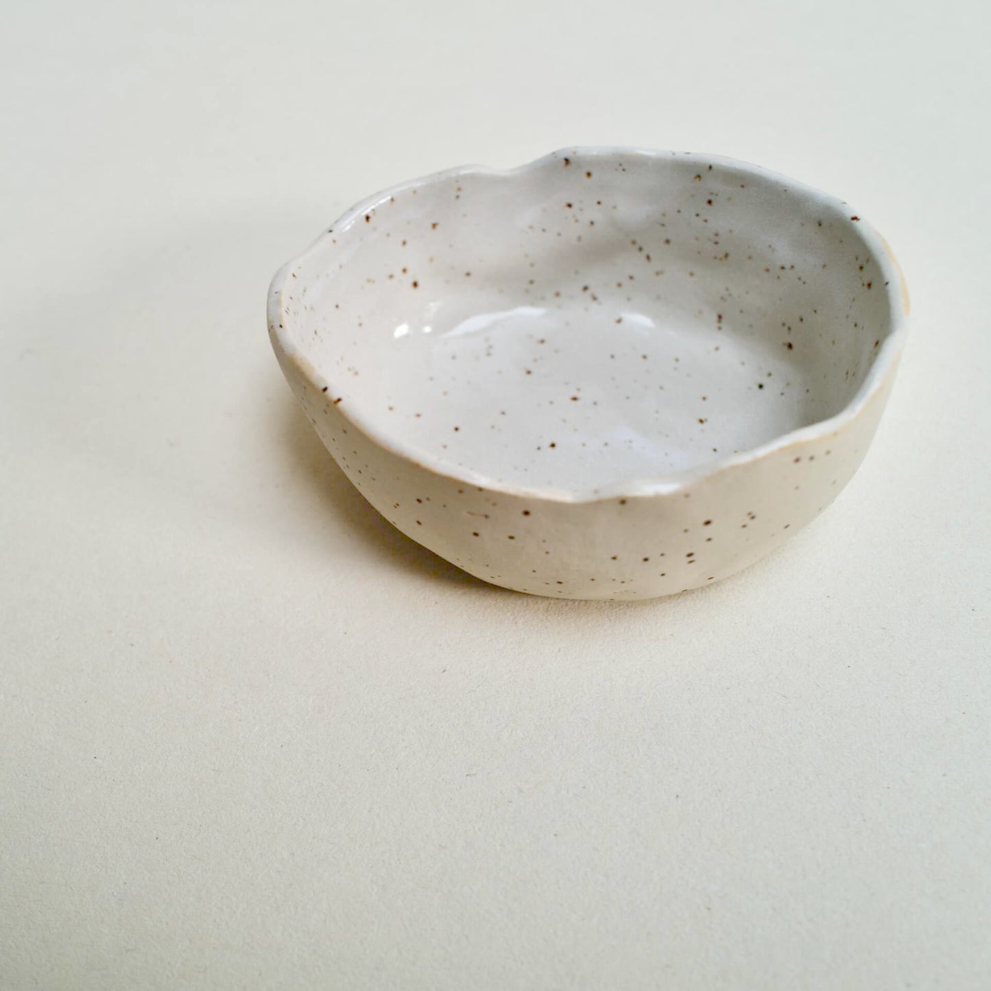 Speckled organic shaped bowl